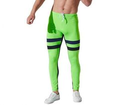 Фото - Стильные спортивные штаны Aqux салатового цвета - Men box