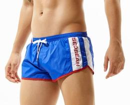 Фото - Яркие короткие шорты для бассейна мужские Seobean синего цвета - Men box