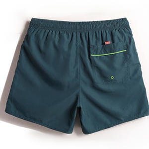 Фото - Плавательные шорты от бренда Qike. Цвет: темно-зеленый - Men box