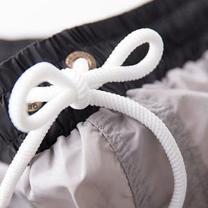 Фото - Купальные шорты Desmit черного цвета с белым поясом - Men box